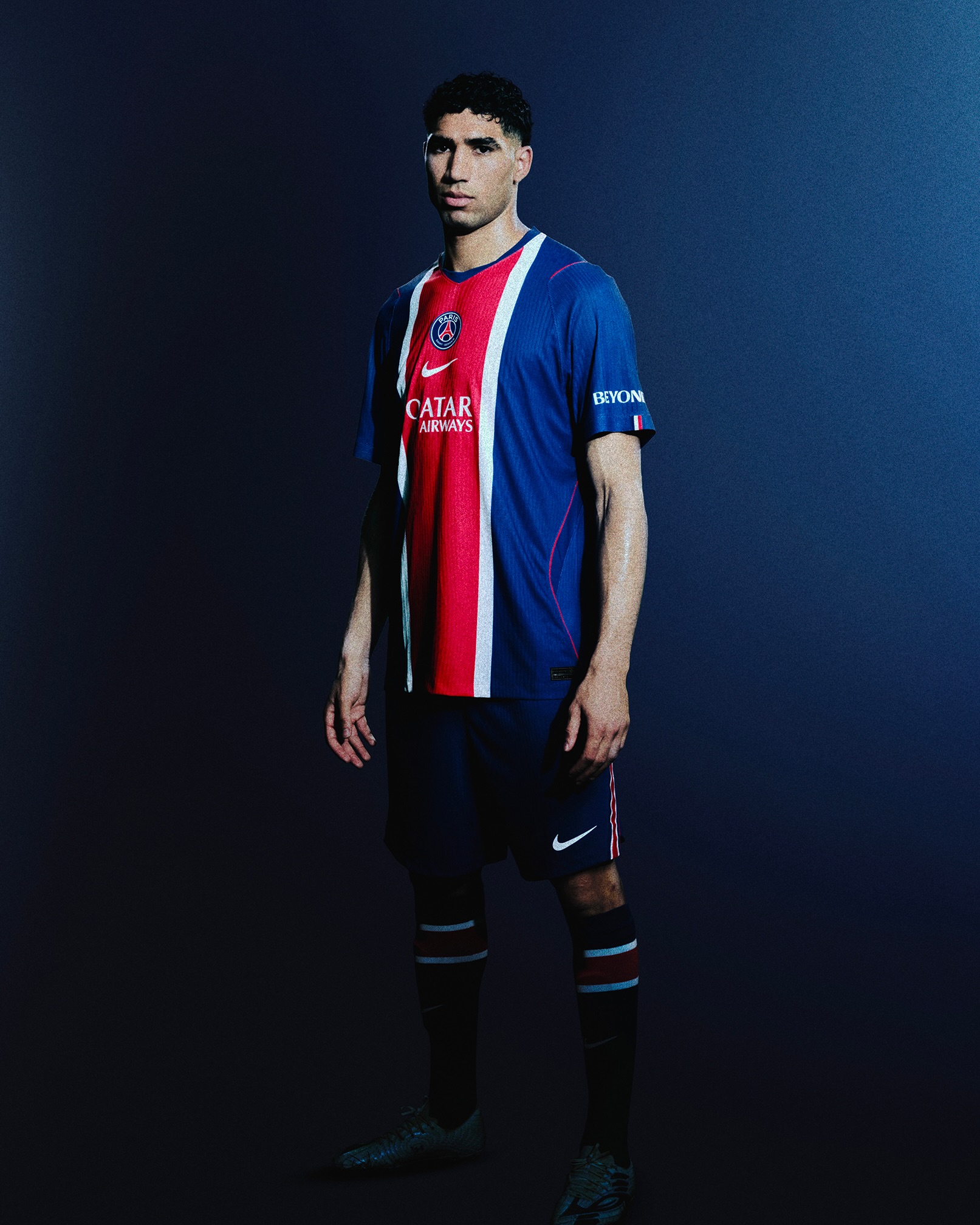 Achraf Hakimi presenting PSG's new jersey